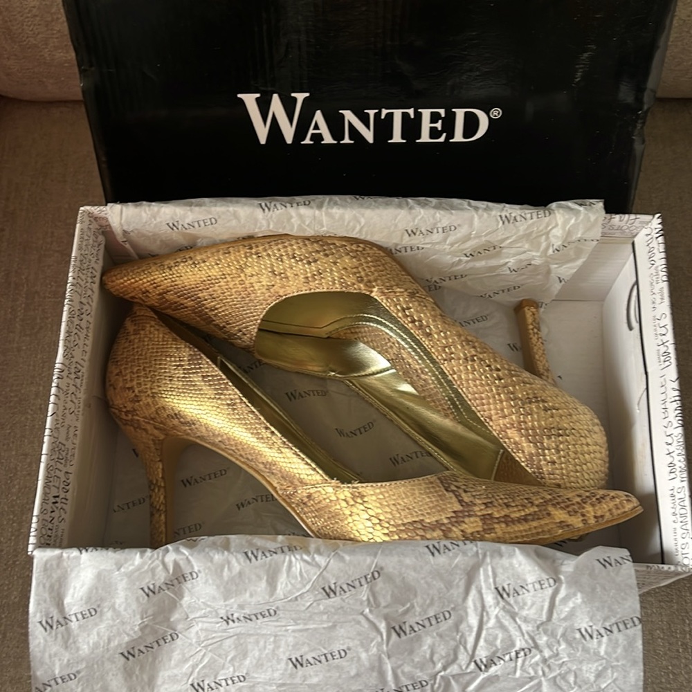 RAMPAGE BRAND NAME. Women shoes snake-like. Size9 M, man made materials. China.